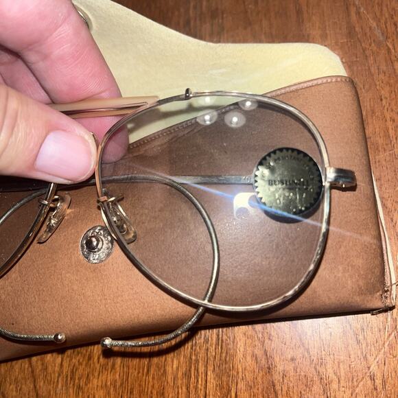 BUSHNELL SPORT PACK BINOCULARS, RADIO, HEADPHONES, GLASSES, CASE - Picture 8 of 11